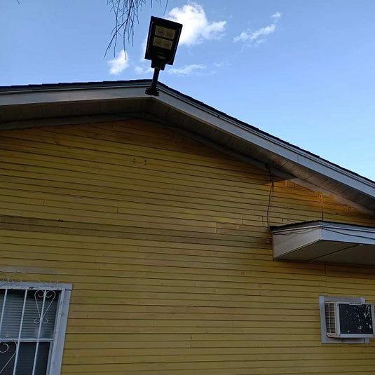 120 w solar powereds street light install on the roof backyard
